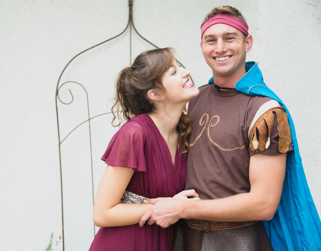 Couple dressing up as disney characters hercules and Meg